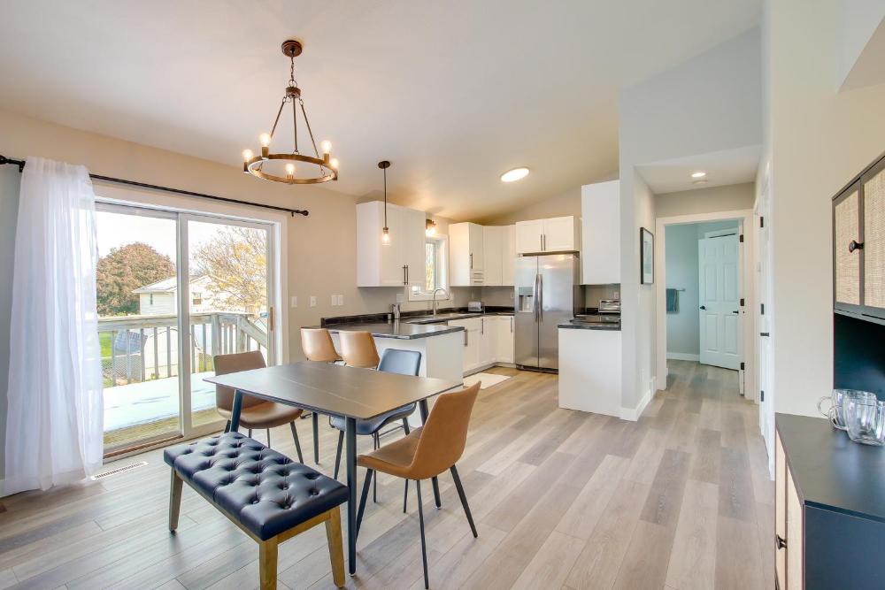 Bright Little Chute Condo with Deck and Yard!